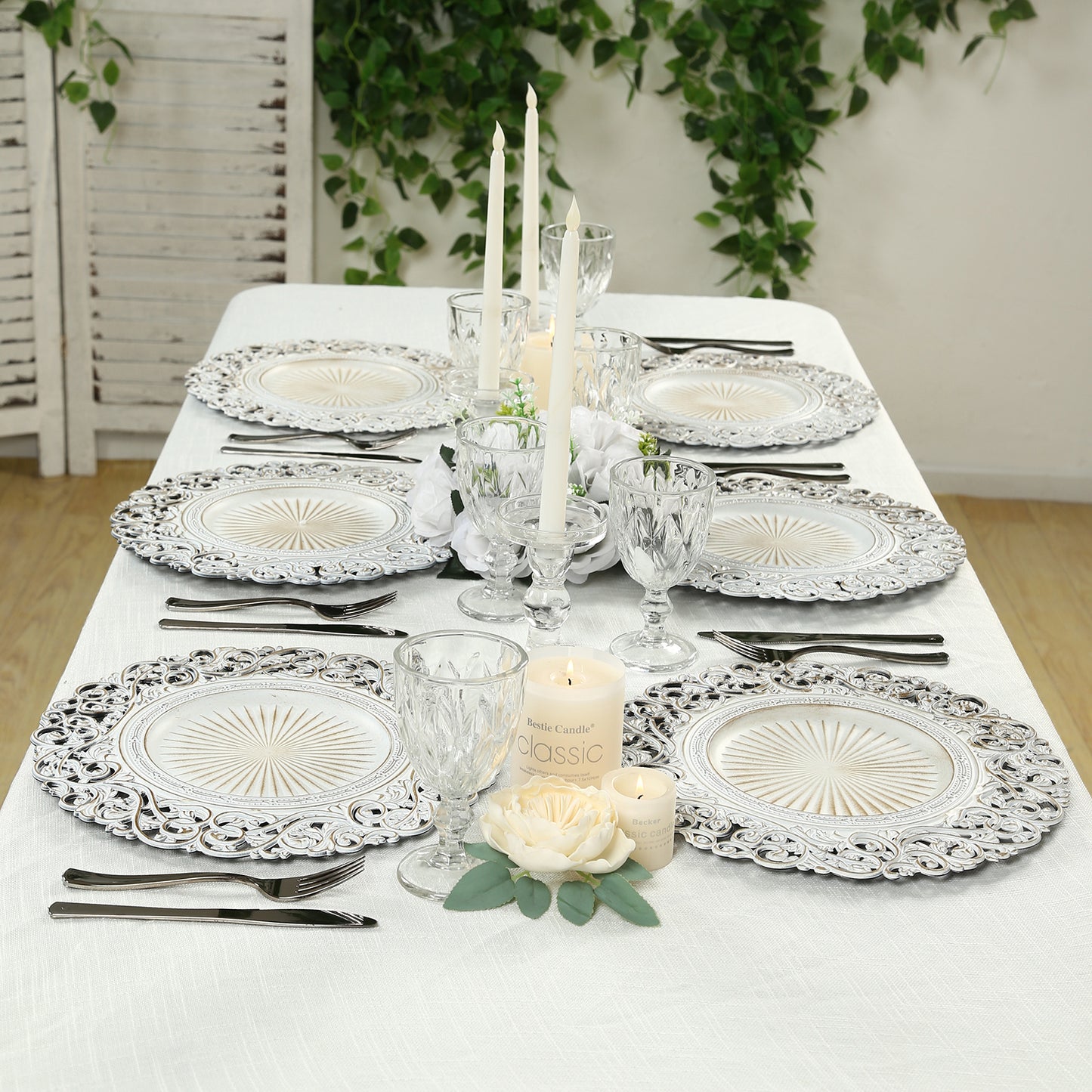 Antique white vintage floral charger plates for elegant tabletop decor.