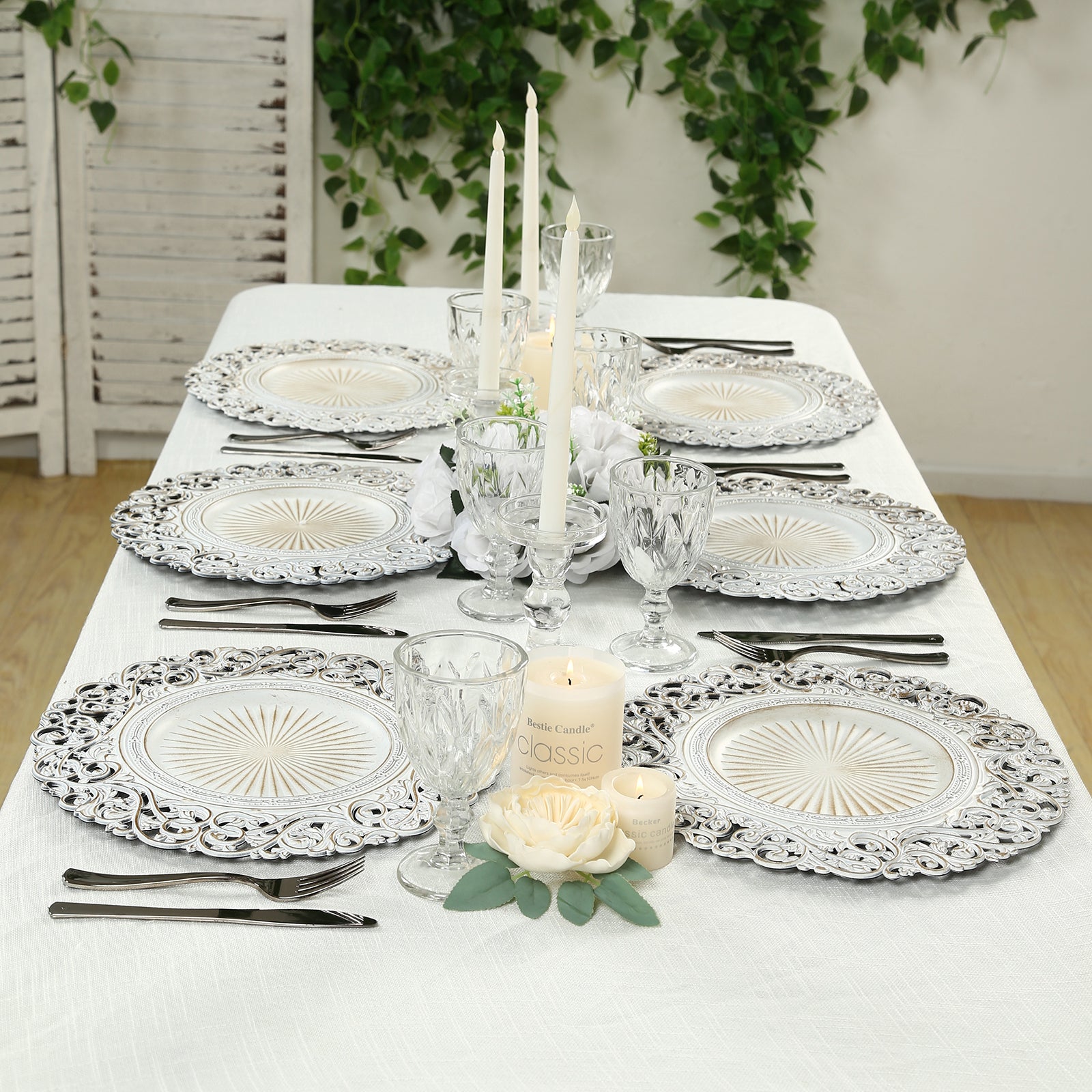 Antique white vintage floral charger plates for elegant tabletop decor.
