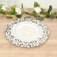Antique white vintage floral charger plate with ornate carved rim.