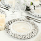 Antique white decorative charger plates with vintage floral rim.