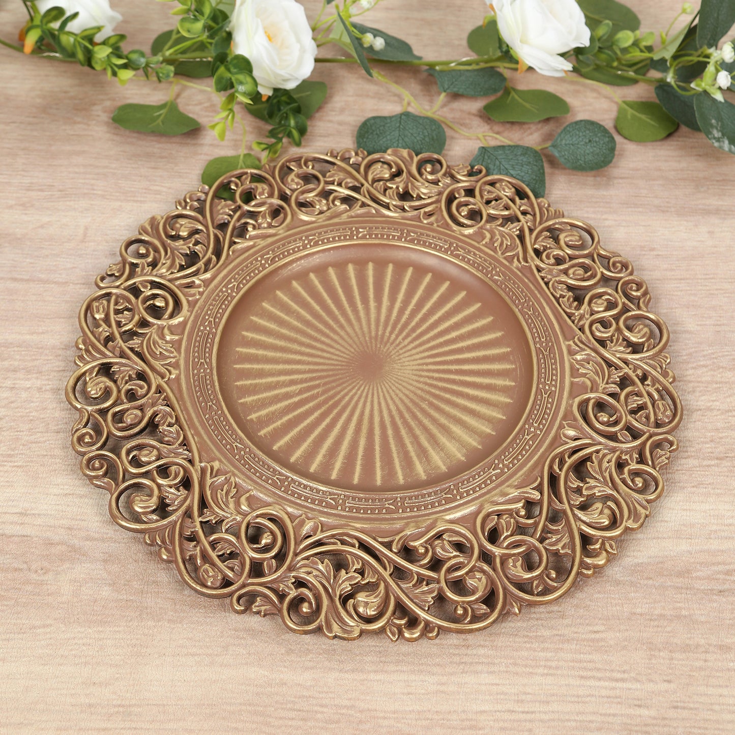 Brown and brushed gold vintage floral charger plate with carved rim.