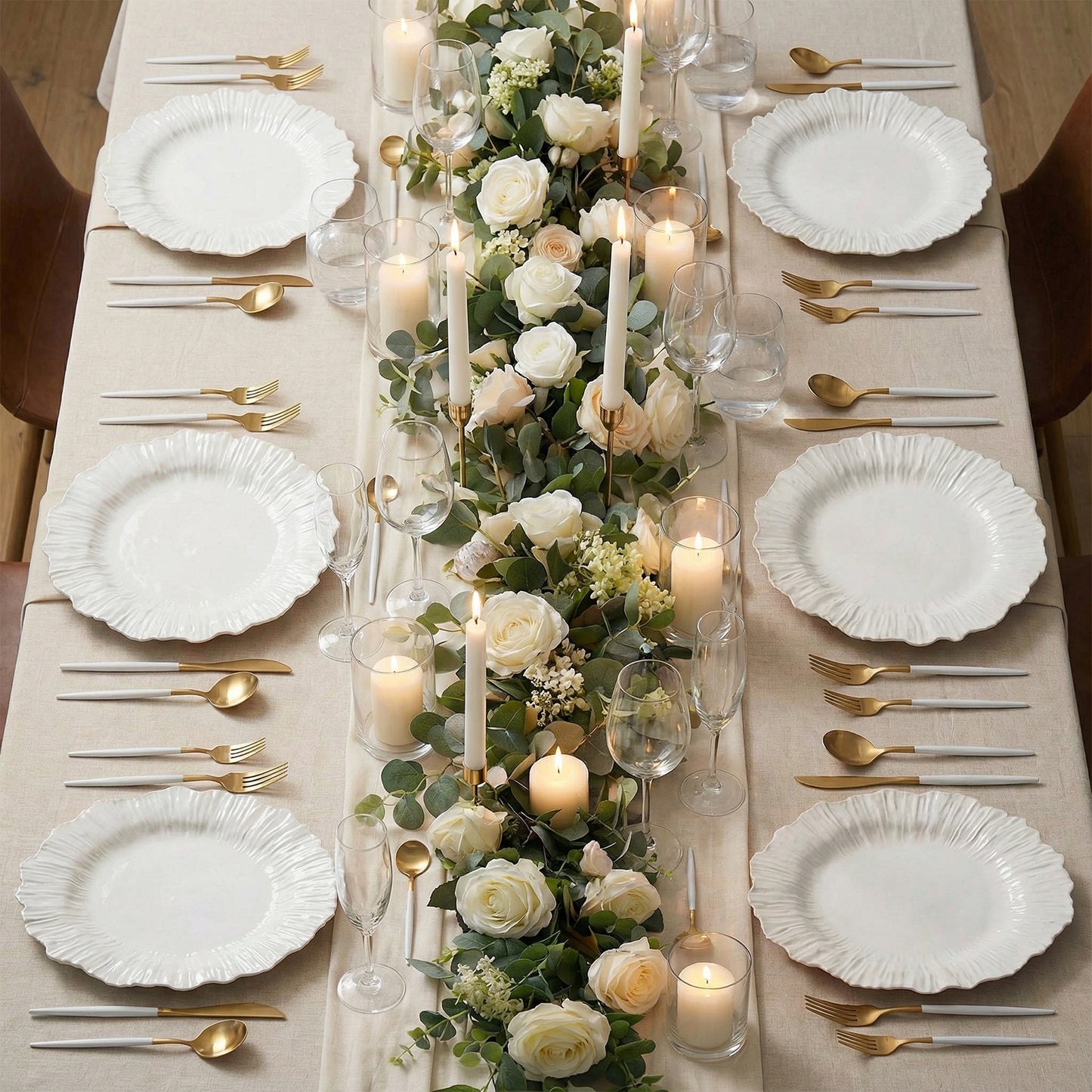 Pearl white charger plates set on an elegant dining table with floral decor.