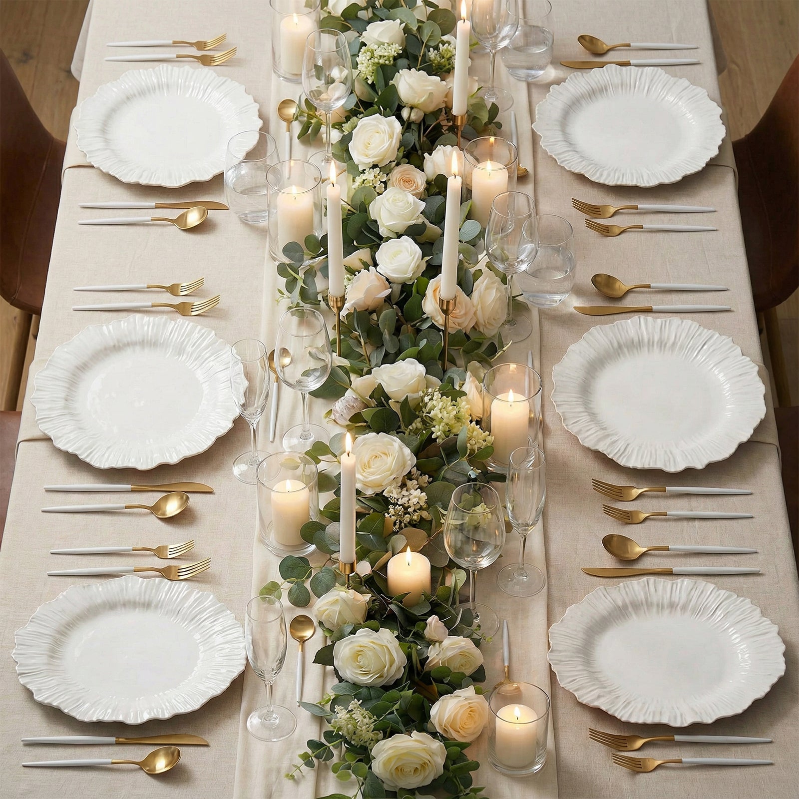 Pearl white charger plates set on an elegant dining table with floral decor.