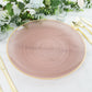 Transparent dusty rose swirl charger plate with gold rim.