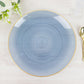 Transparent dusty blue swirl charger plate with gold rim.