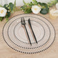 Clear charger plates with black beaded rim for stylish dinner parties.