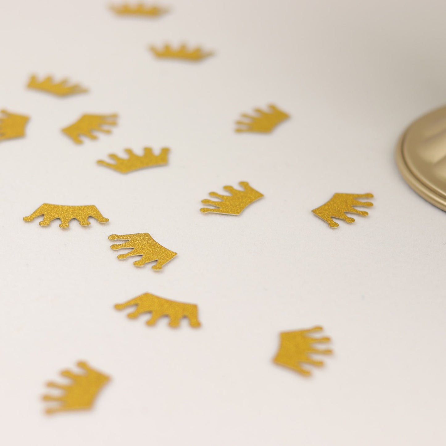 Gold glitter crown paper confetti for princess theme party decoration.