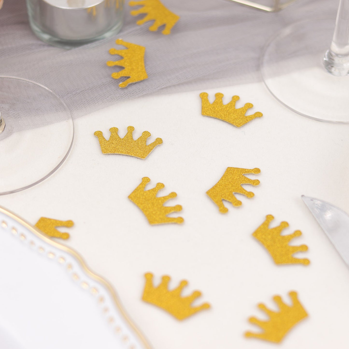 Gold glitter crown confetti for princess theme party decoration.