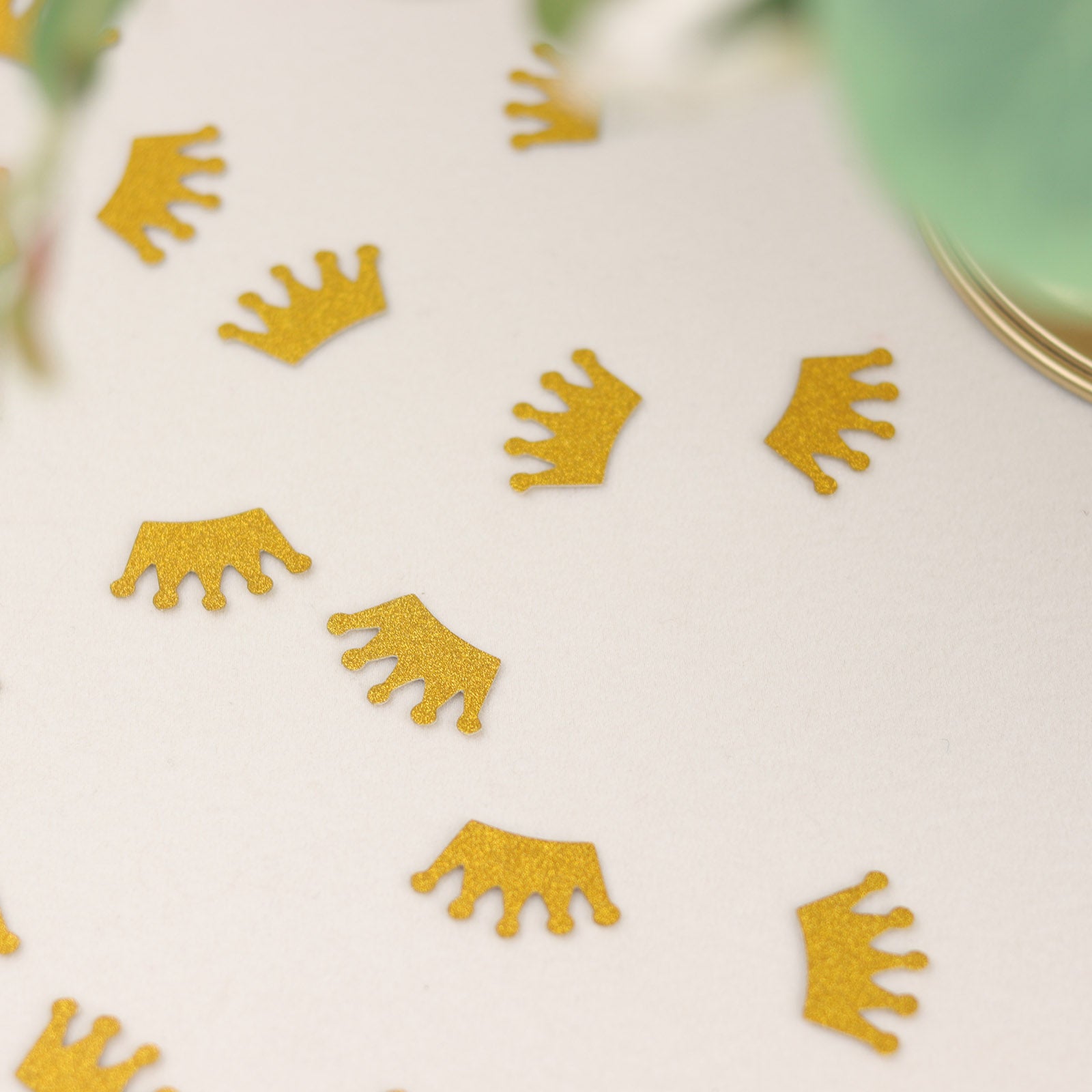 Gold glitter crown confetti for princess theme party decoration.