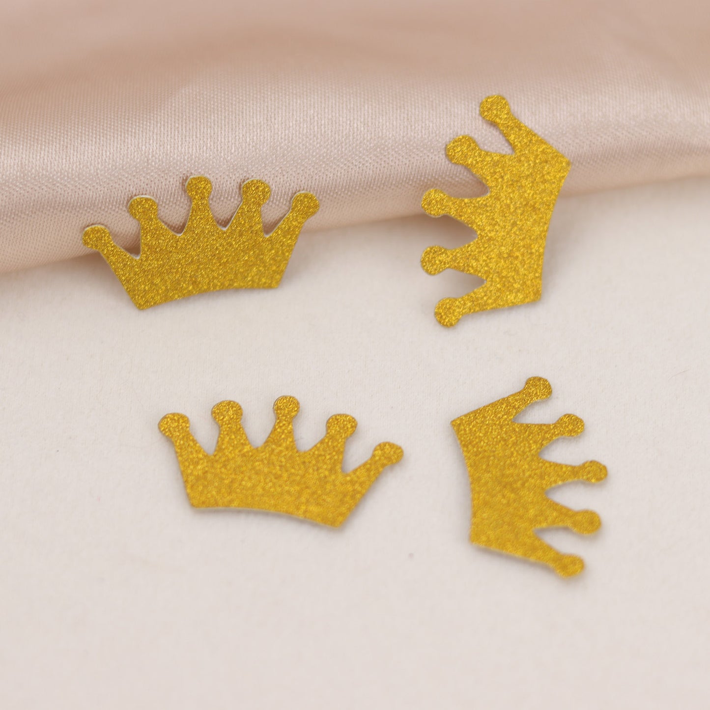Gold glitter crown confetti for princess theme party decoration.