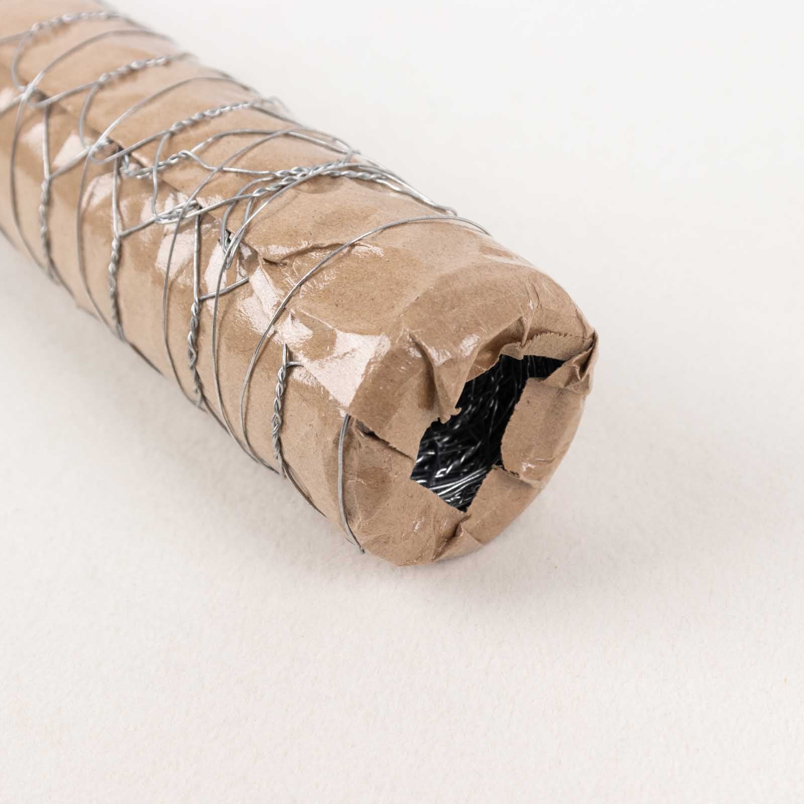 Silver galvanized metal hexagonal chicken wire mesh roll for DIY crafts and garden fencing.