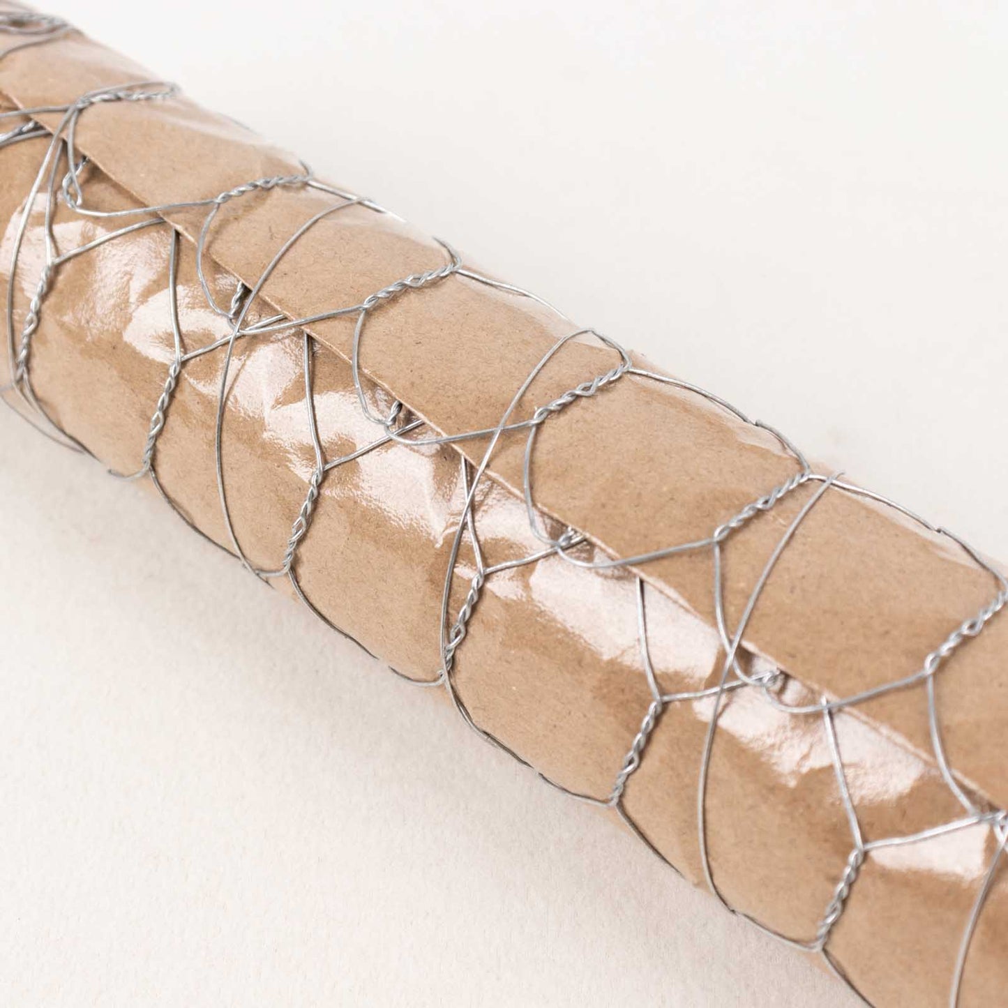 Silver galvanized metal hexagonal chicken wire mesh for crafts and fencing.