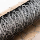Silver galvanized metal hexagonal chicken wire mesh for crafts and fencing.