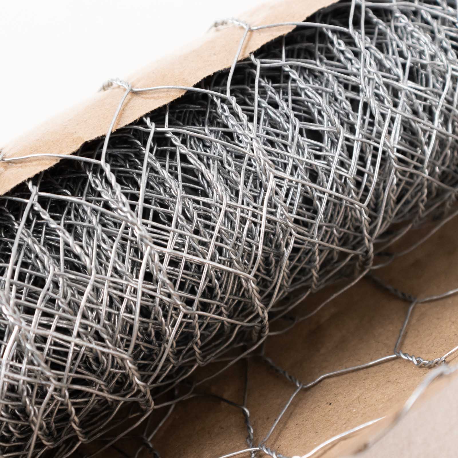 Silver galvanized metal hexagonal chicken wire mesh for crafts and fencing.