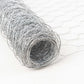 Silver galvanized metal hexagonal chicken wire mesh roll for DIY crafts and garden fencing.
