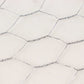 Silver galvanized metal hexagonal chicken wire mesh for DIY crafts and garden fencing.