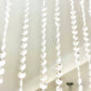 Clear acrylic crystal beaded curtain strands for room divider.