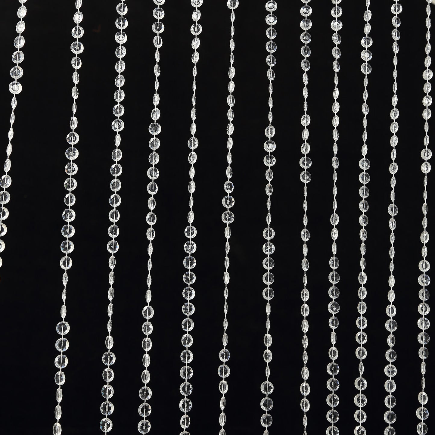 Clear acrylic crystal beaded curtain with diamond cut beads.