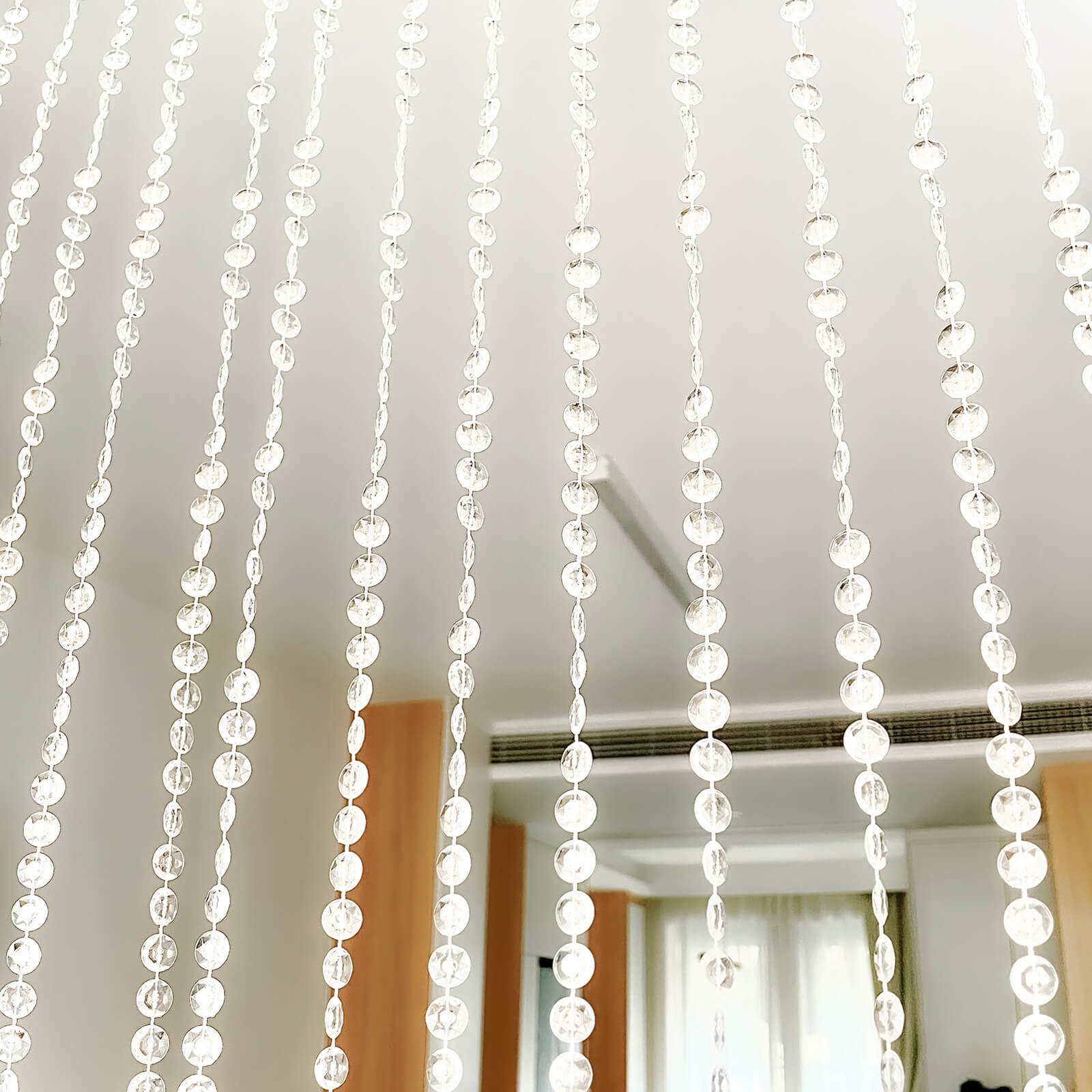 Clear acrylic beaded curtain with diamond cut beads, 5ftx10ft.