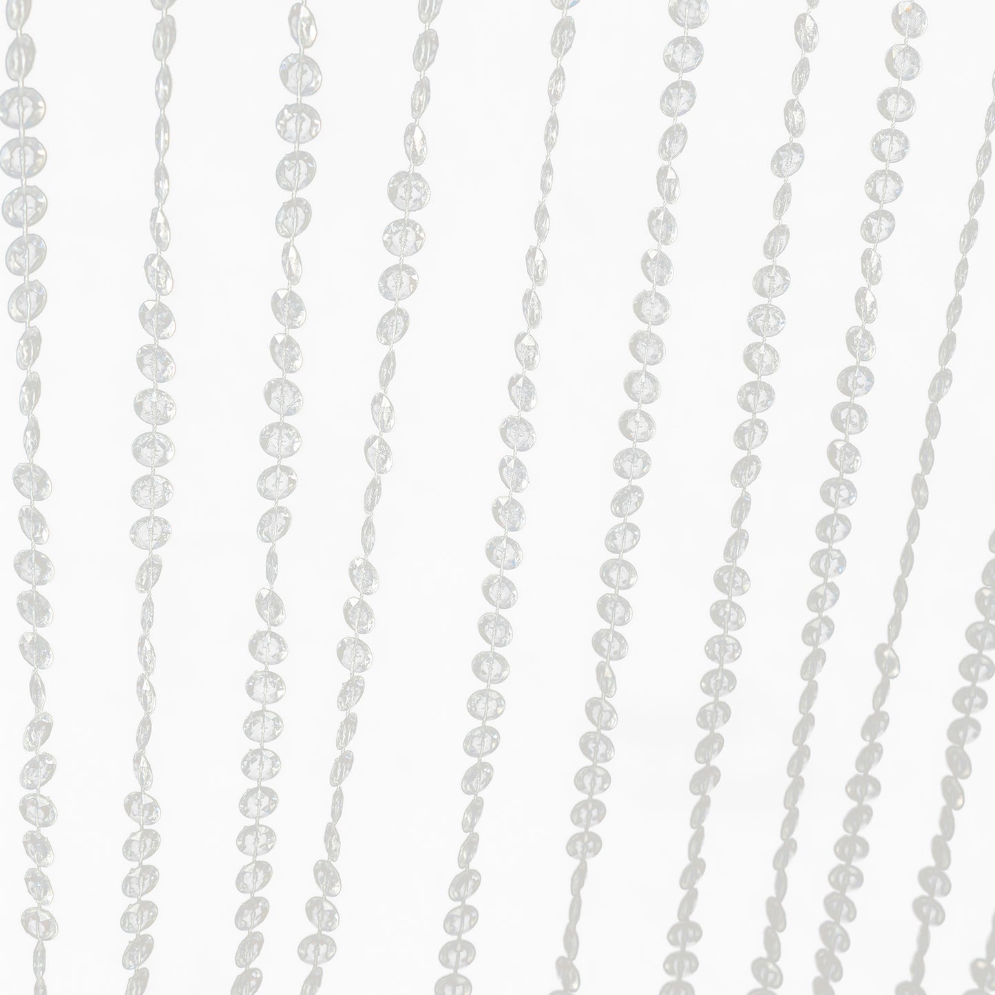 Clear acrylic crystal beaded curtain with diamond cut beads.