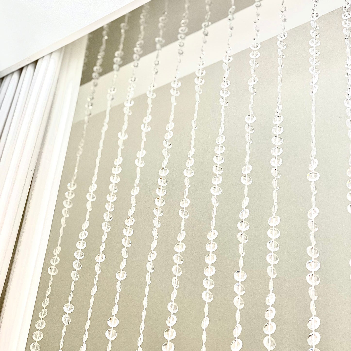 Clear acrylic beaded curtain with diamond cut beads, 5ftx12ft.