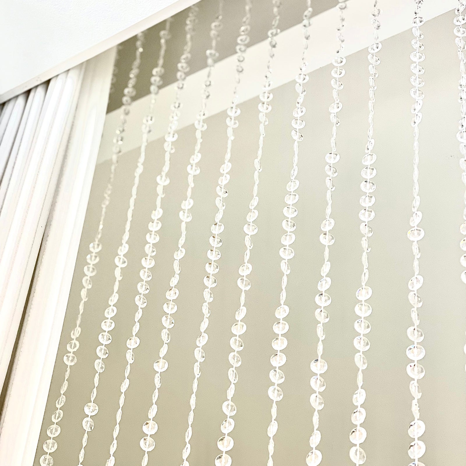 Clear acrylic beaded curtain with diamond cut beads, 5ftx12ft.