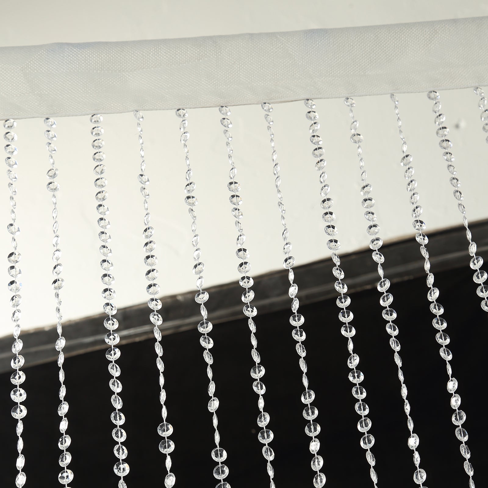 Clear acrylic beaded curtain with fabric rod pocket, 5ftx12ft.