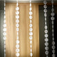 Clear acrylic beaded curtain with fabric rod pocket, 5ftx16ft.