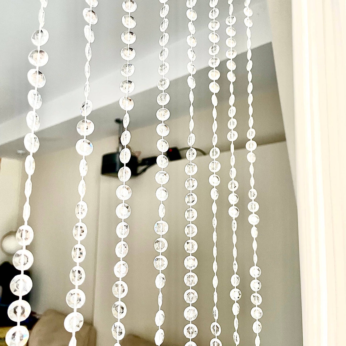 Clear acrylic beaded curtain with fabric rod pocket, 5ftx16ft.