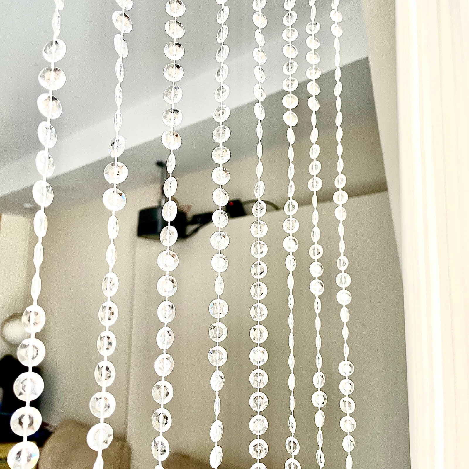 Clear acrylic beaded curtain with fabric rod pocket, 5ftx16ft.
