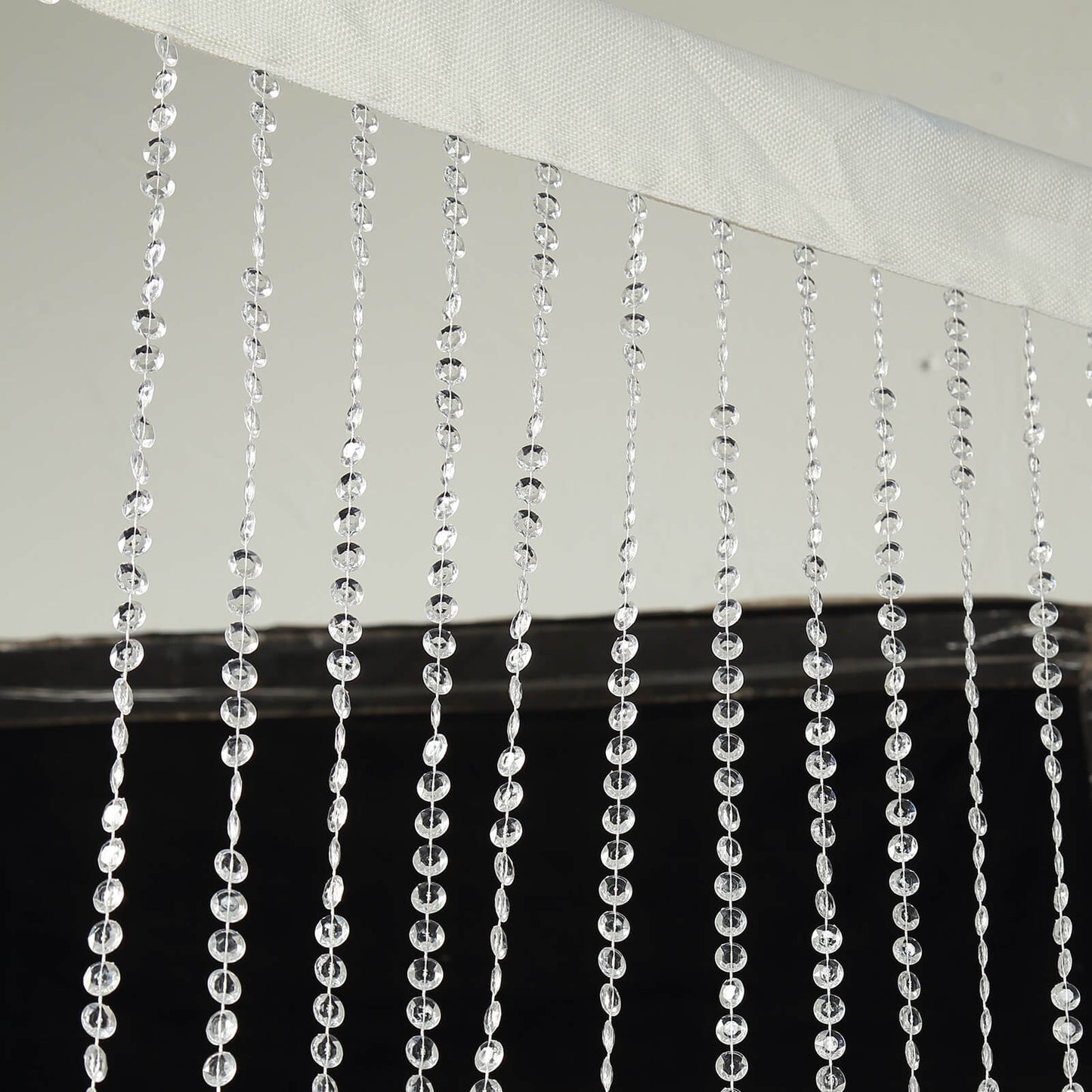 Clear acrylic beaded curtain with fabric rod pocket, 5ftx16ft.