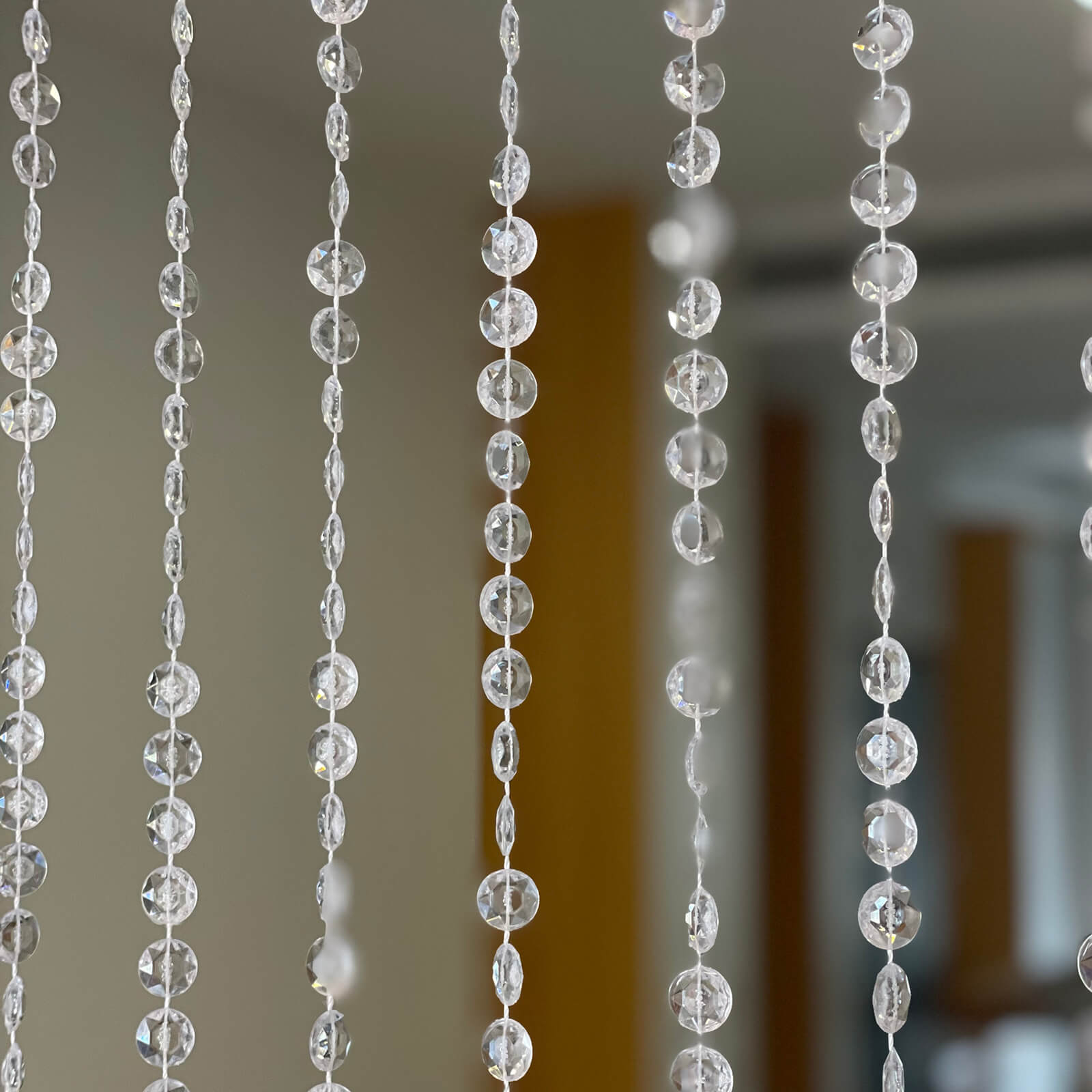 Clear acrylic beaded curtain with diamond cut beads, 5ftx16ft.