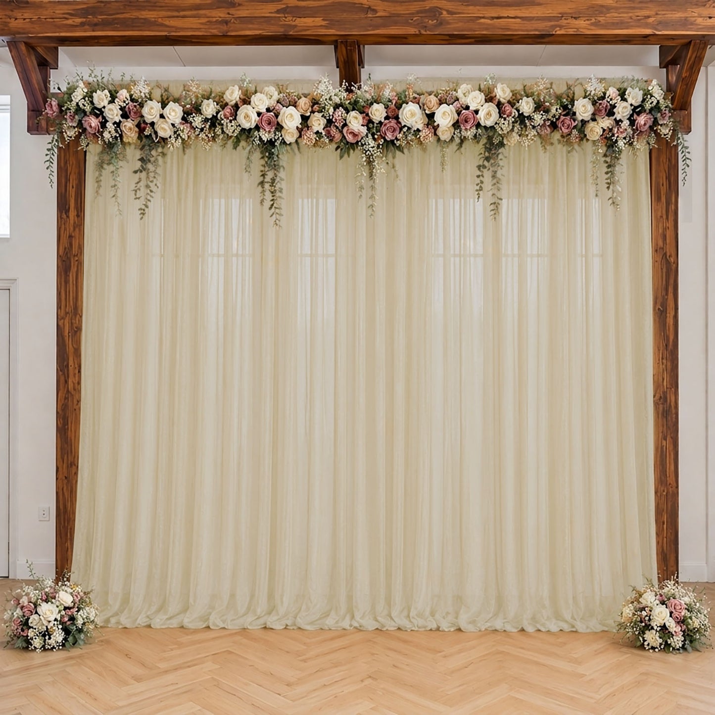Beige sheer backdrop drape for wedding arch and ceiling decor.