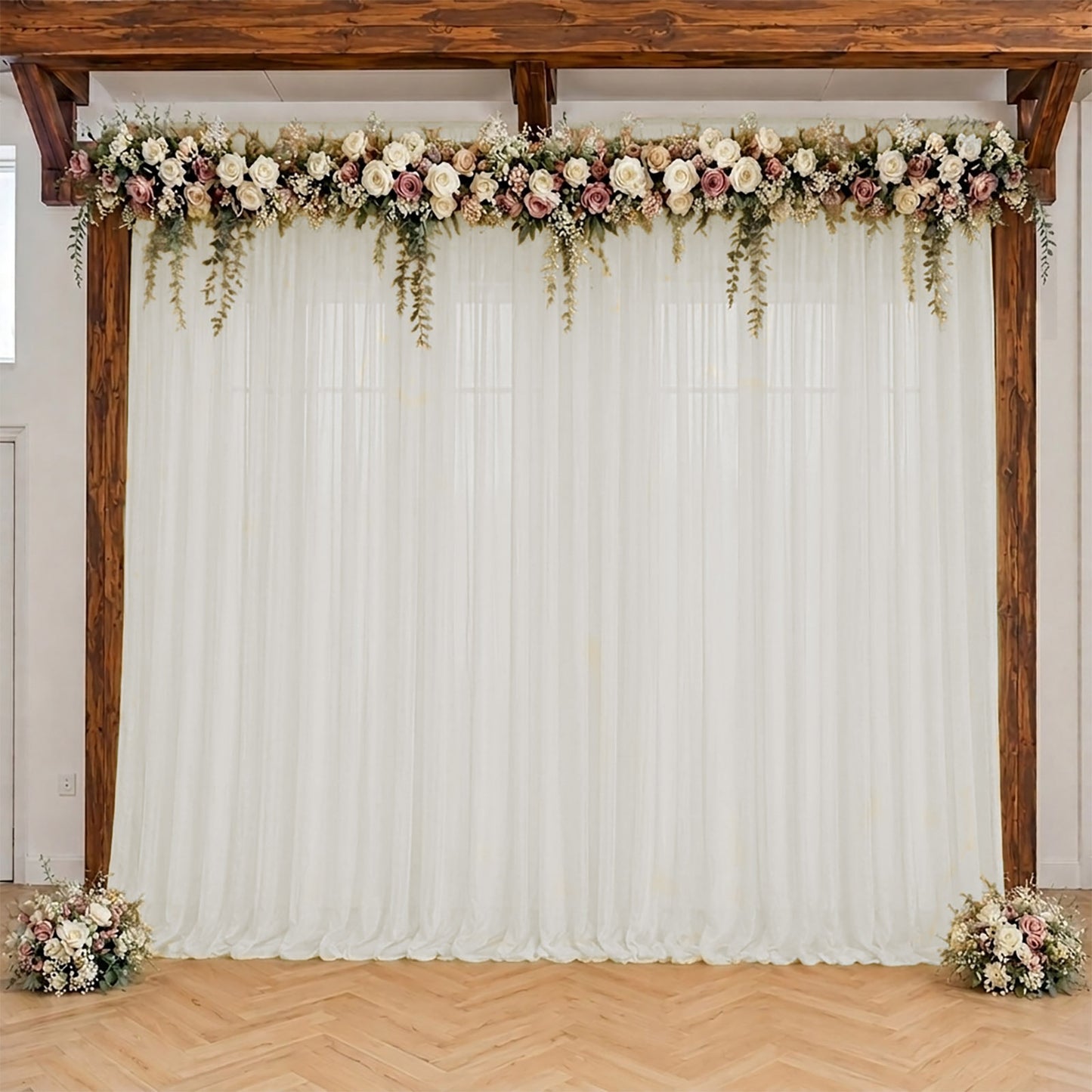 Ivory sheer backdrop drape for wedding arch and ceiling decor.