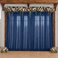 Navy blue sheer backdrop drape for wedding arch and ceiling decor.