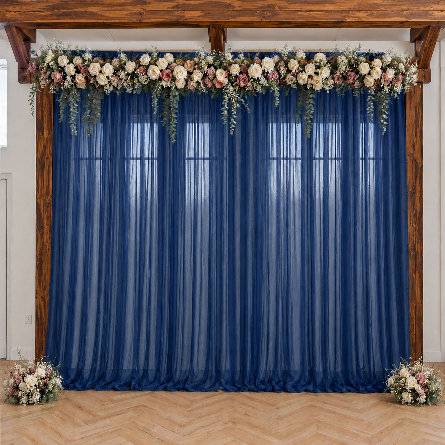 Navy blue sheer backdrop drape for wedding arch and ceiling decor.