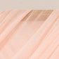 Blush sheer backdrop drape for wedding arch and ceiling decor.