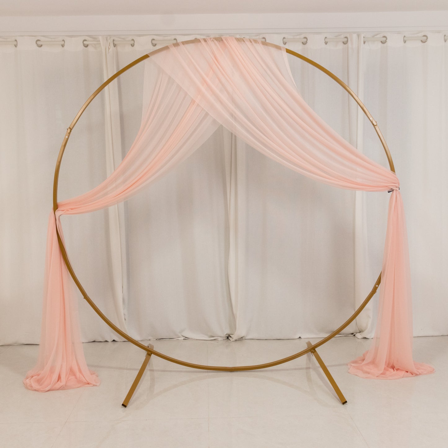Pink sheer ceiling drape for wedding canopy and reception décor.
