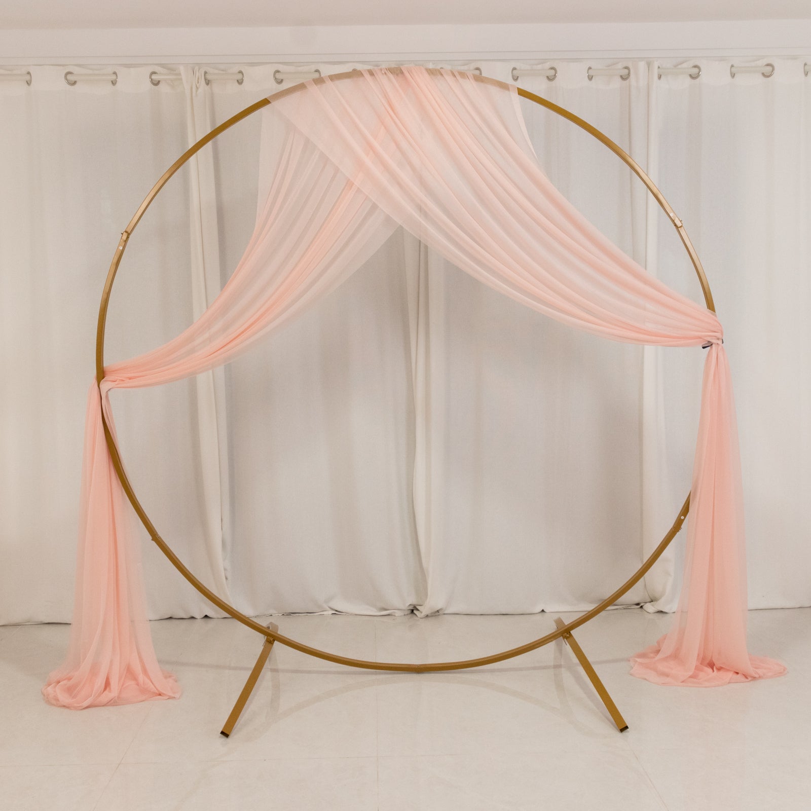 Pink sheer ceiling drape for wedding canopy and reception décor.