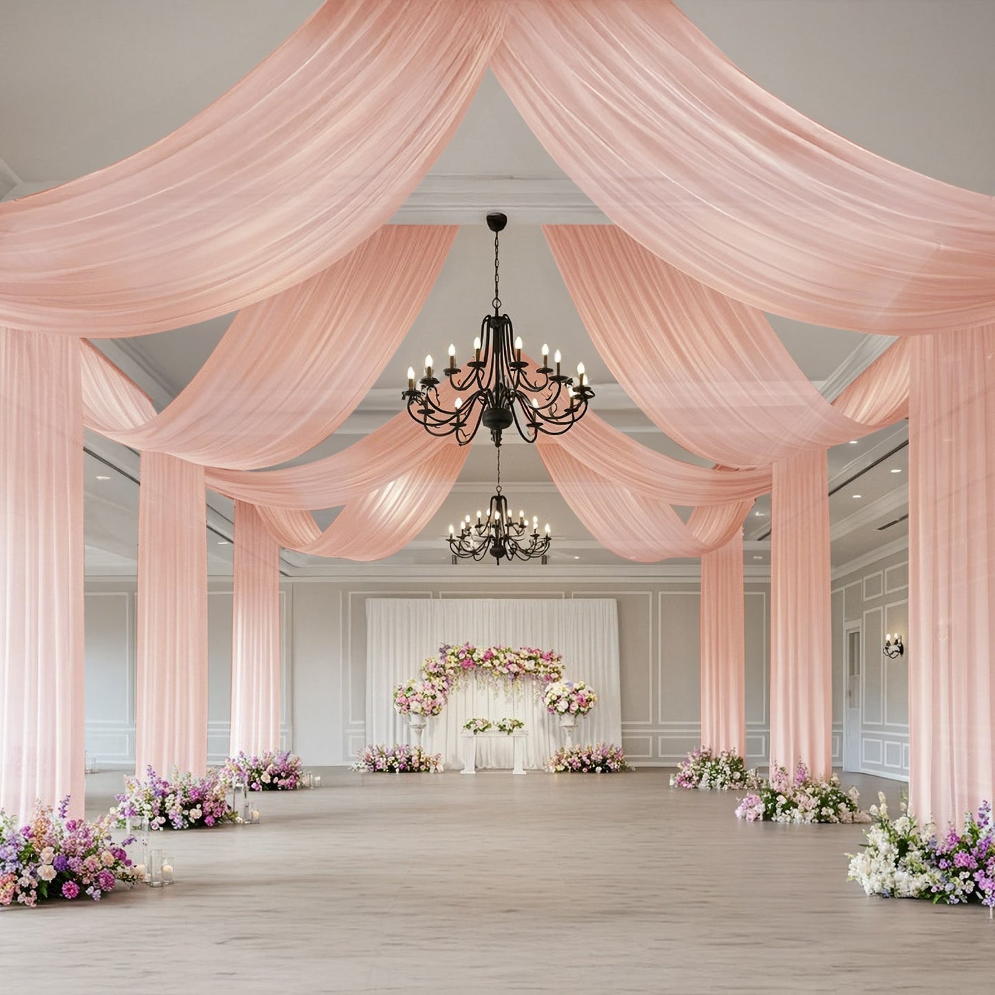 Blush sheer backdrop drape for elegant wedding arch and ceiling decor.
