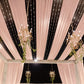 Blush sheer backdrop drape for wedding arch and ceiling decor.