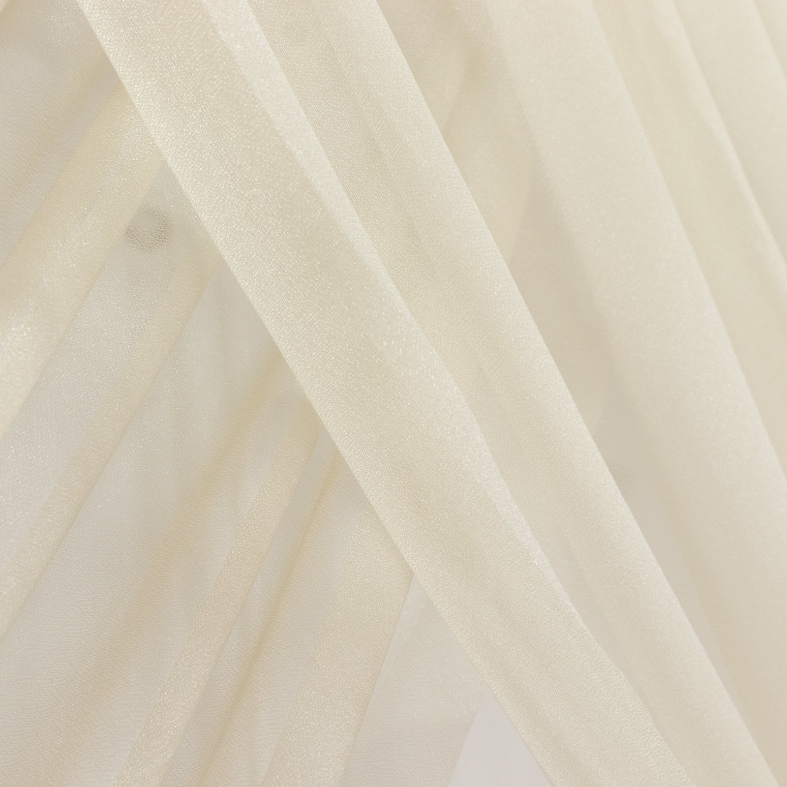Beige sheer backdrop drape with soft shimmer for wedding arch decor. #whtbkgd