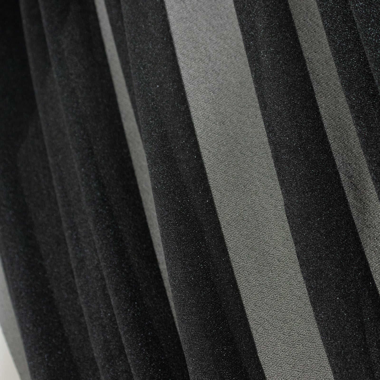 Black sheer backdrop drape for wedding arch and ceiling decor.