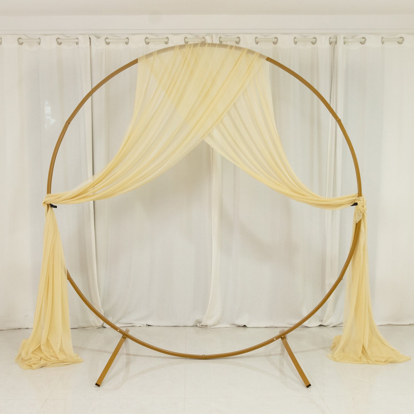Champagne sheer backdrop drape for wedding arch and ceiling decor.