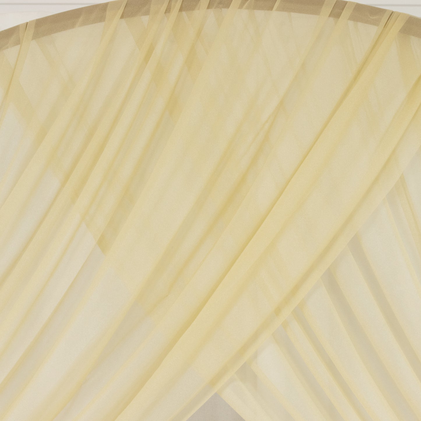 Champagne sheer backdrop drape for wedding arch and ceiling decor.