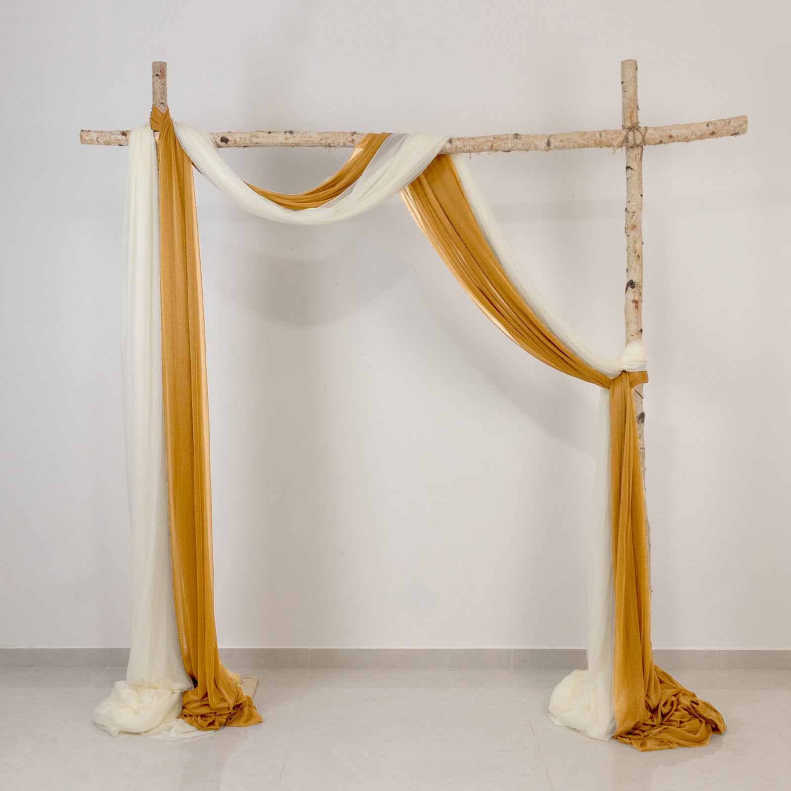 Brown and cream wedding arch drape, ideal for elegant decor.