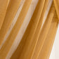 Gold sheer backdrop drape for wedding arch and ceiling decor.