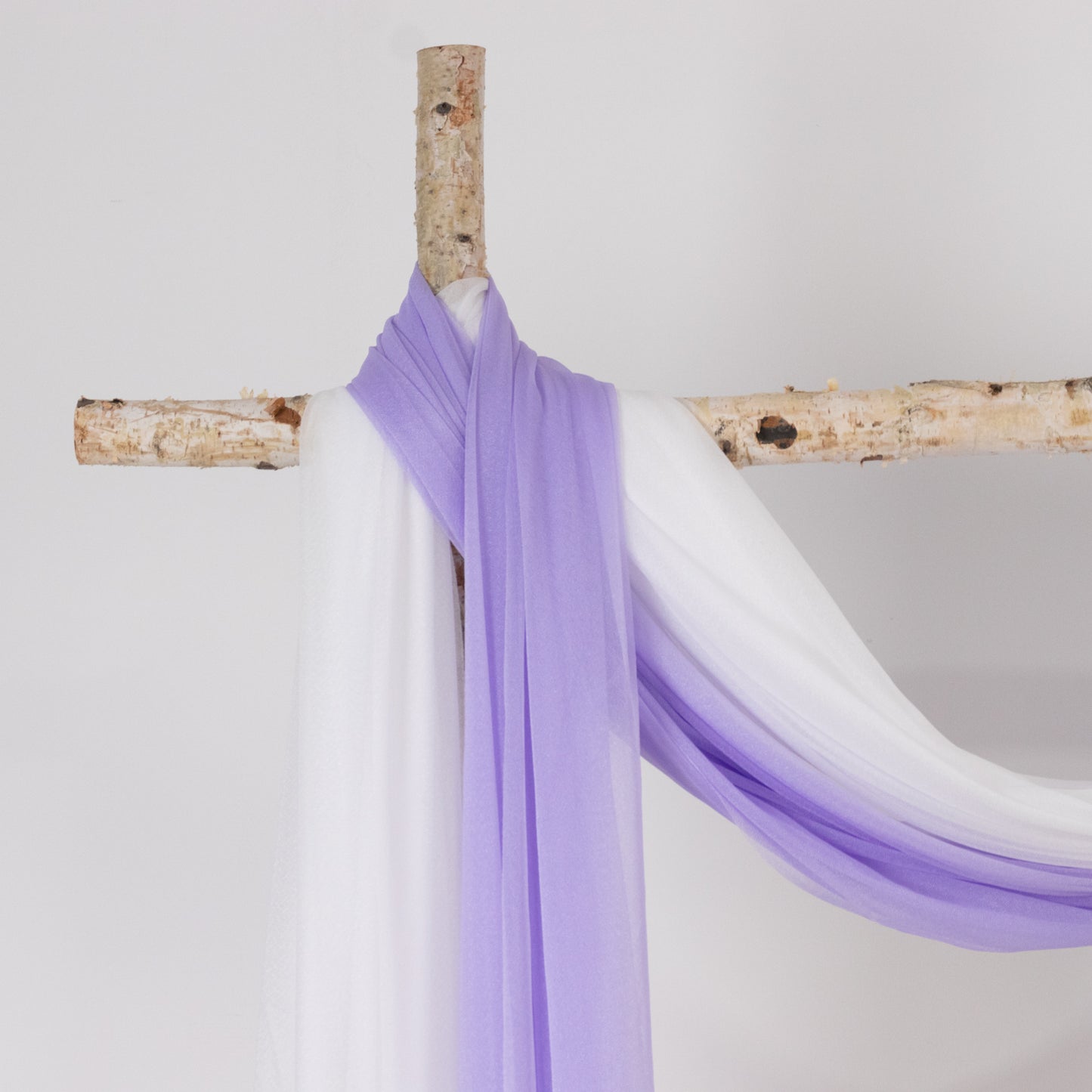 Lavender lilac sheer backdrop drape for wedding arch and ceiling decor.