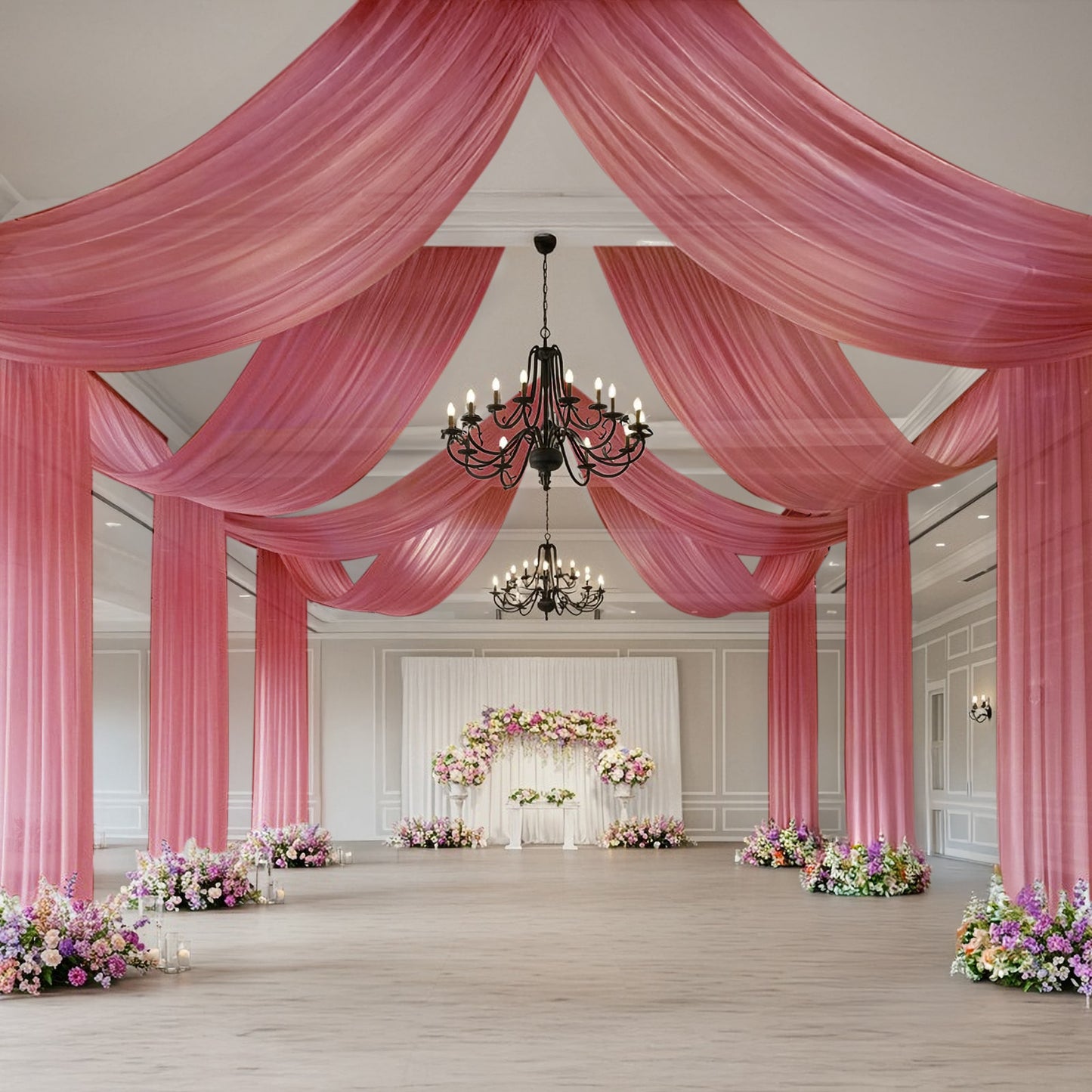 Mauve sheer backdrop drape for wedding arch and ceiling decor.