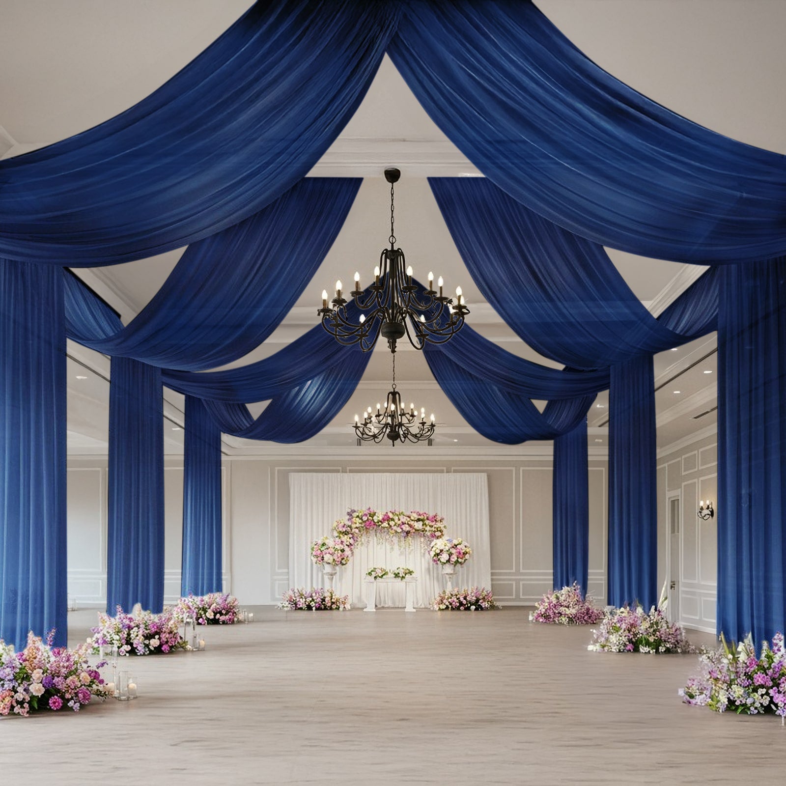 Navy blue sheer backdrop drape for wedding arch and ceiling decor.